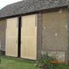 Porte coulissante pour grange