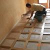 Pose d'un parquet mixte dalles céramique - chêne